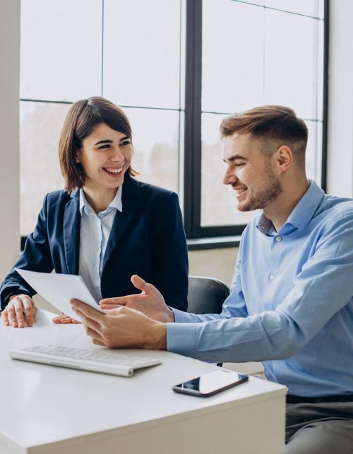 Business team working in office and discussing job issues